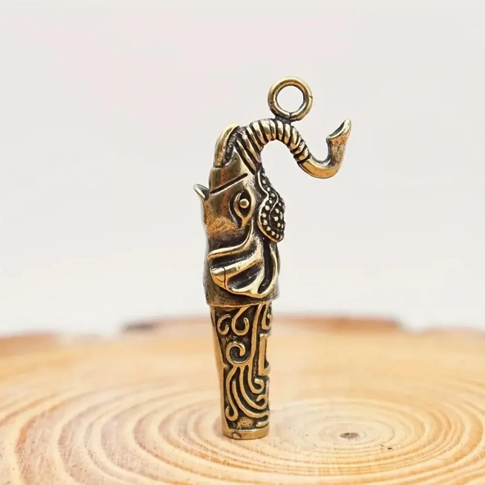 Vintage brass elephant whistle pendant
